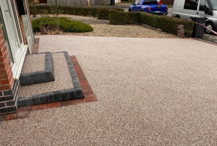 Resin bound driveway with block and brick detail edging